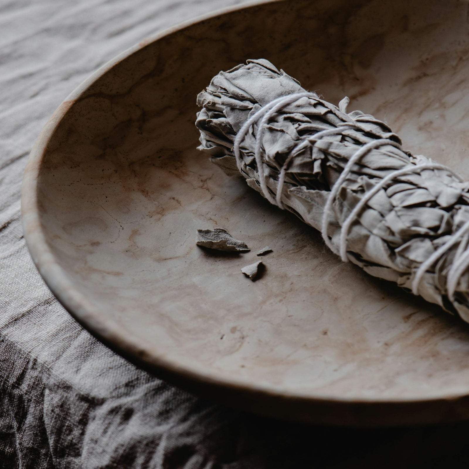 Sage on a smudging plate. Autumn Sage fragrance oil for soap and candle making. By Scentivore. 