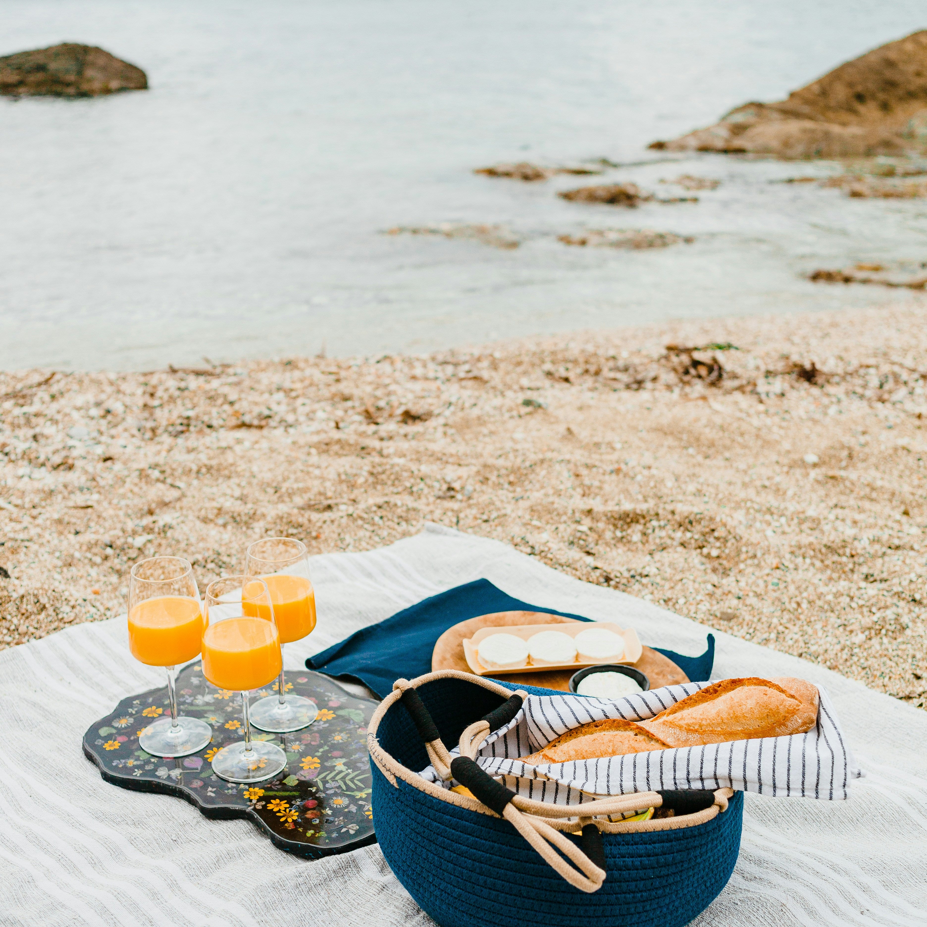 Beach blanket picnic at the beach. Beachfront Blanket fragrance oil by Scentivore. 