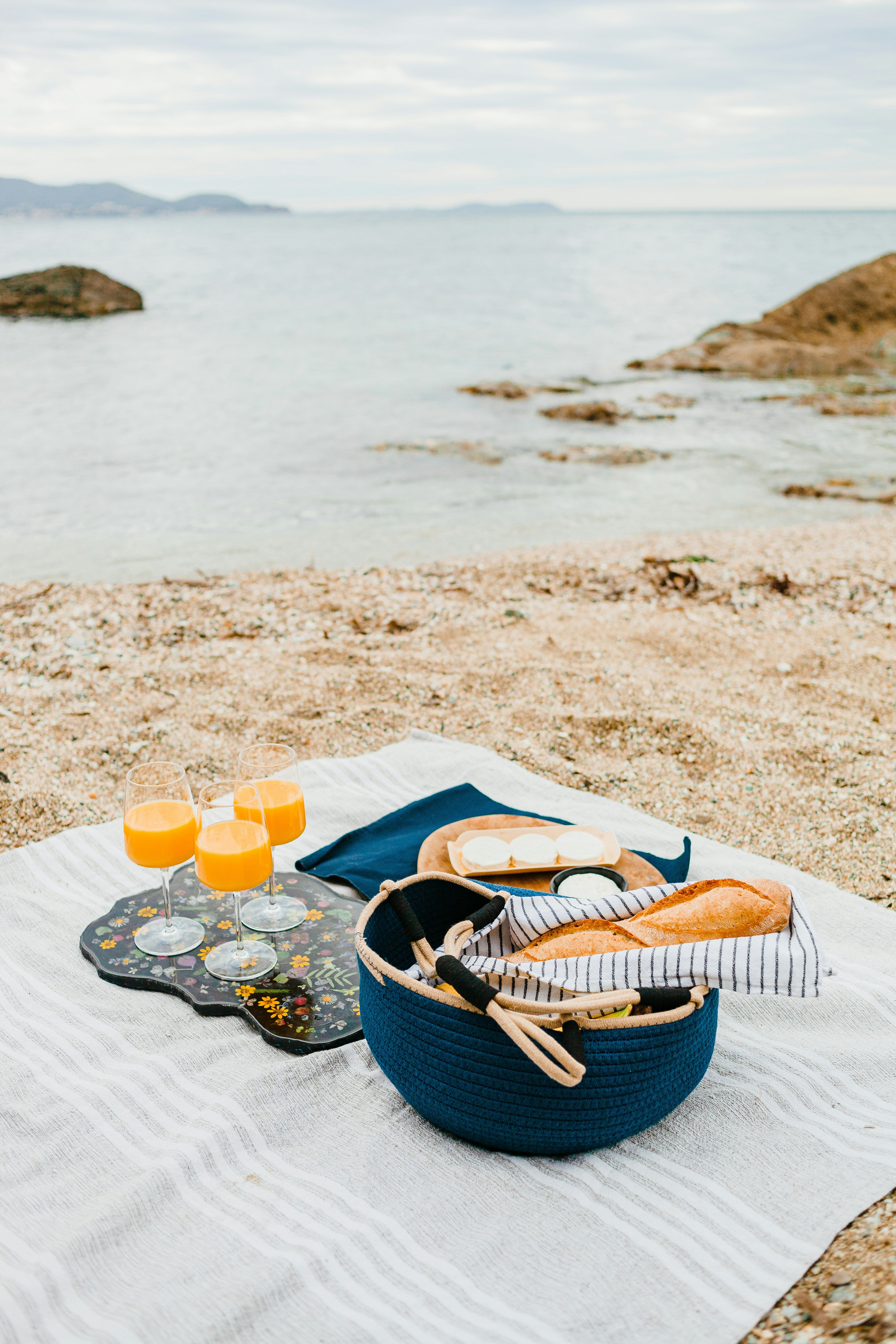 Beach blanket picnic at the beach. Beachfront Blanket fragrance oil by Scentivore. 