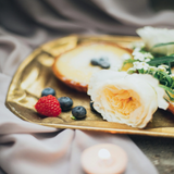 Berries and roses on a platter. Berry Rose Twist fragrance oil by Scentivore.