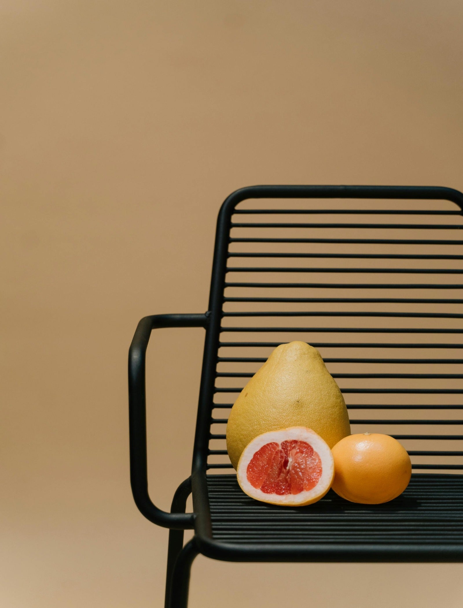 Fresh pomelo fruits. Bright Pomelo & Amber fragrance oil by Scentivore. Soap and candle-making fragrance wholesale.