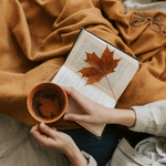 Reading a book while being tucked in a cashmere blanket. Cashmere fragrance oil by Scentivore.