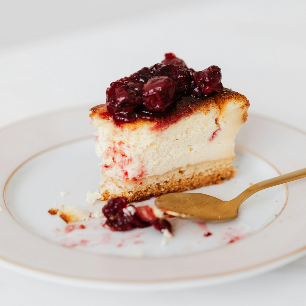 A slice of cherry cheesecake. Cherry Cheesecake fragrance oil scent. For soap and candle-making. 