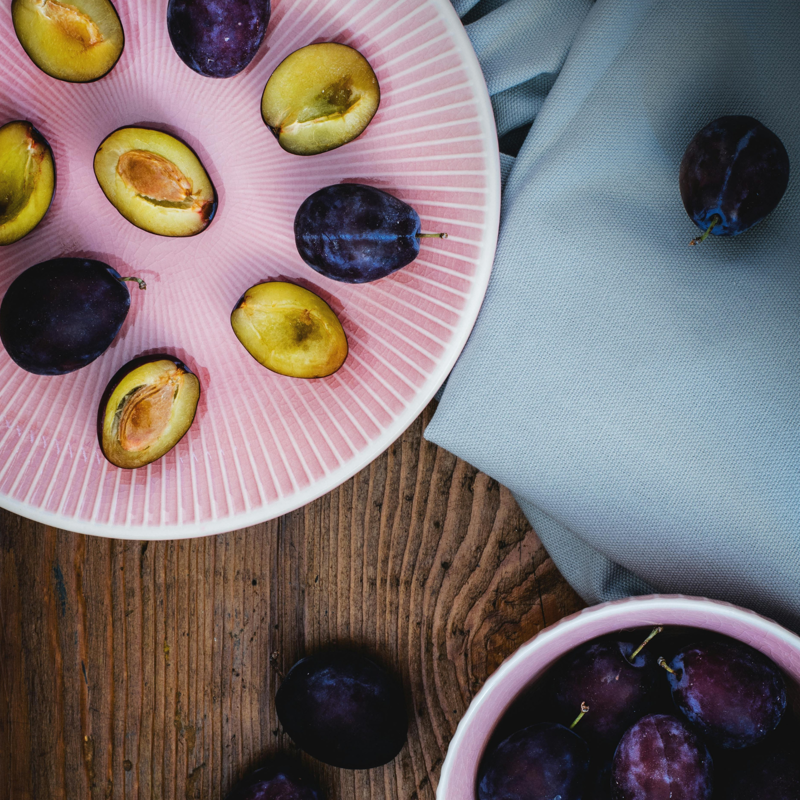 Plum fruits, sliced. Fruity Plum & Amber fragrance oil for soaps and candles. Scentivore fragrance oil.