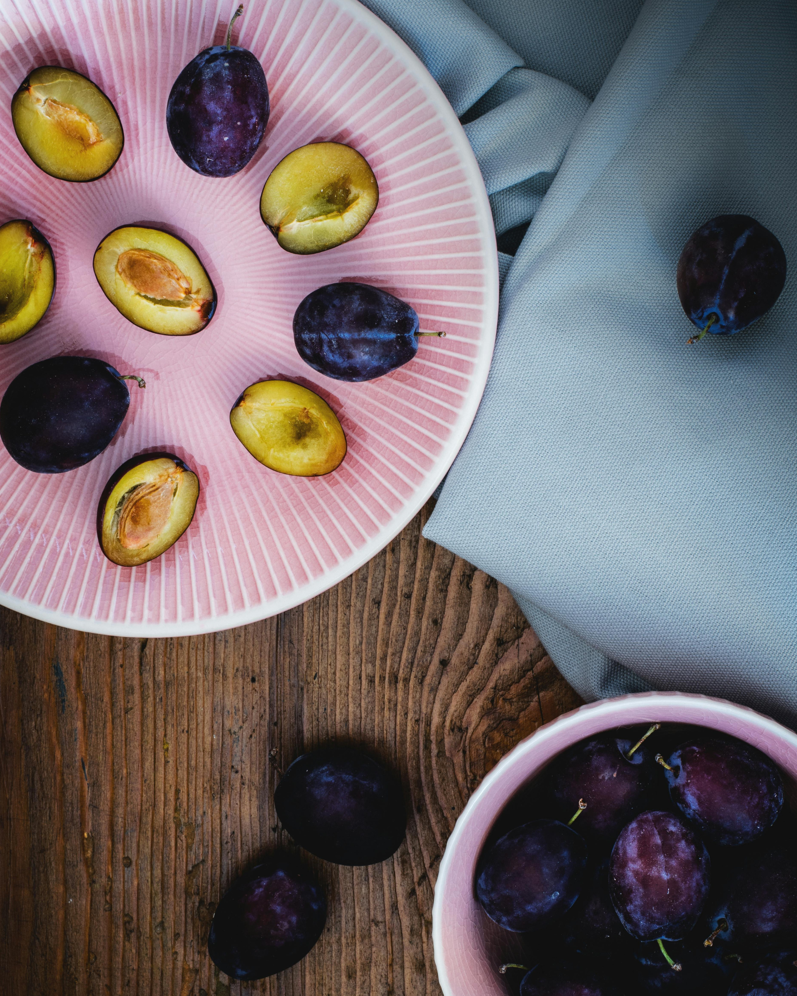 Plum fruits, sliced. Fruity Plum & Amber fragrance oil for soaps and candles. Scentivore fragrance oil.