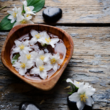 Jasmine flowers in a bowl. Jasmine + Musk fragrance oil for soap and candle making. 