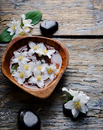 Jasmine flowers in a bowl. Jasmine + Musk fragrance oil for soap and candle making. 