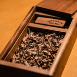 A box of fine tobacco. Tobacco + Teakwood fragrance oil by Scentivore. For soap and candle making.